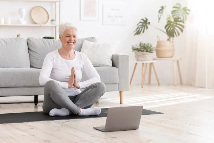 Woman-Practising-Mindfulness-in-front-of-Laptop